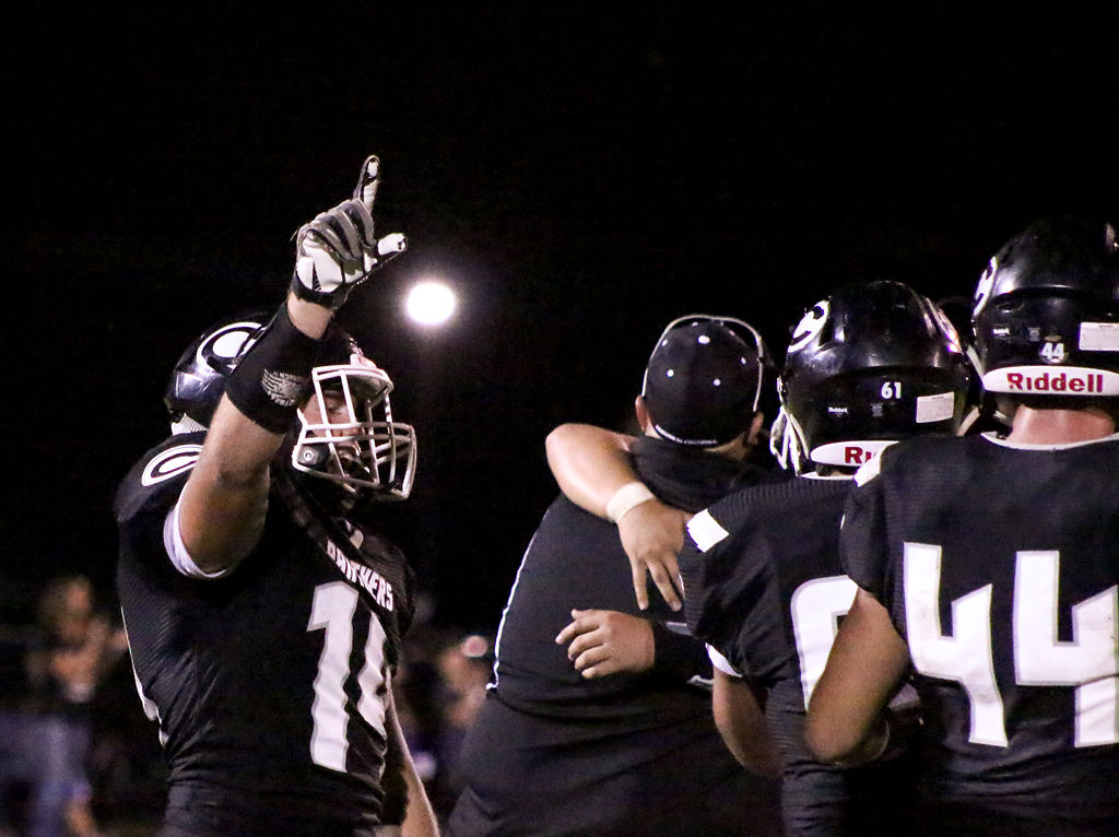 Grafton Littrell celebrates with his teammates